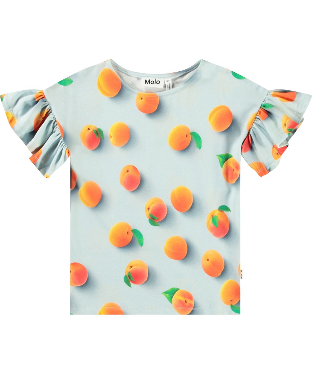 Rayah - Fresh Apricots - Ljusblå ekologisk bomullst-shirt för barn med en rund halsringning och volangärmar.
