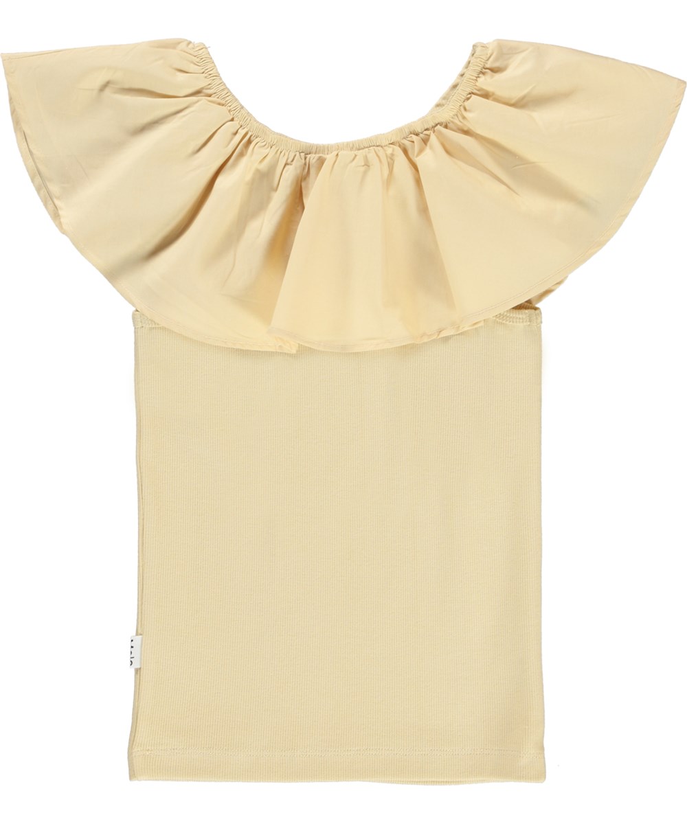 Reca - Starlight - Ekologisk ljusgul volangtopp.