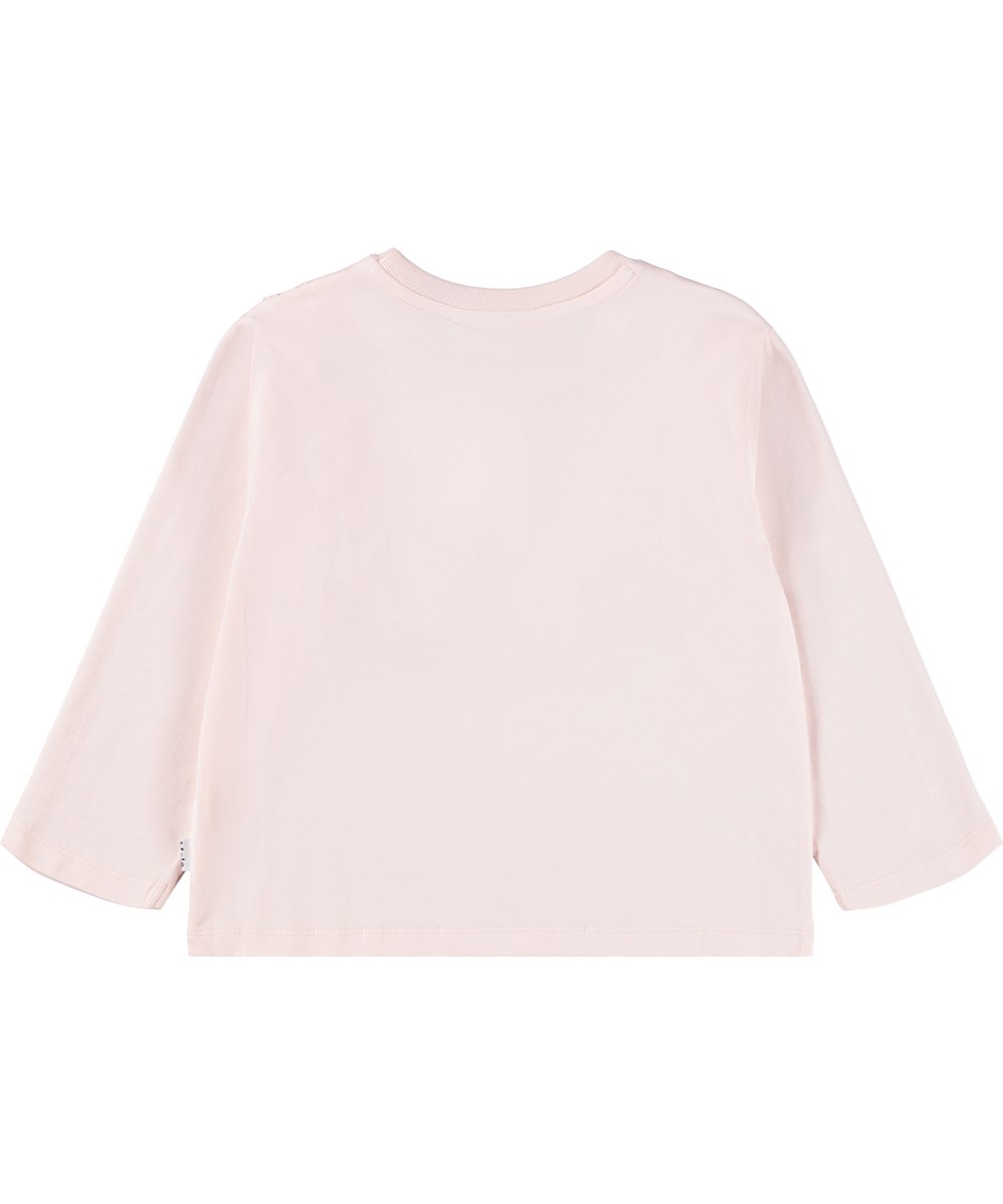 Rena - Rose Hips - Rosa långärmad blus för barn i mjuk ekologisk bomull med en rund hals och vågig nederkant samt broderidetaljer i anglaisesnitt.