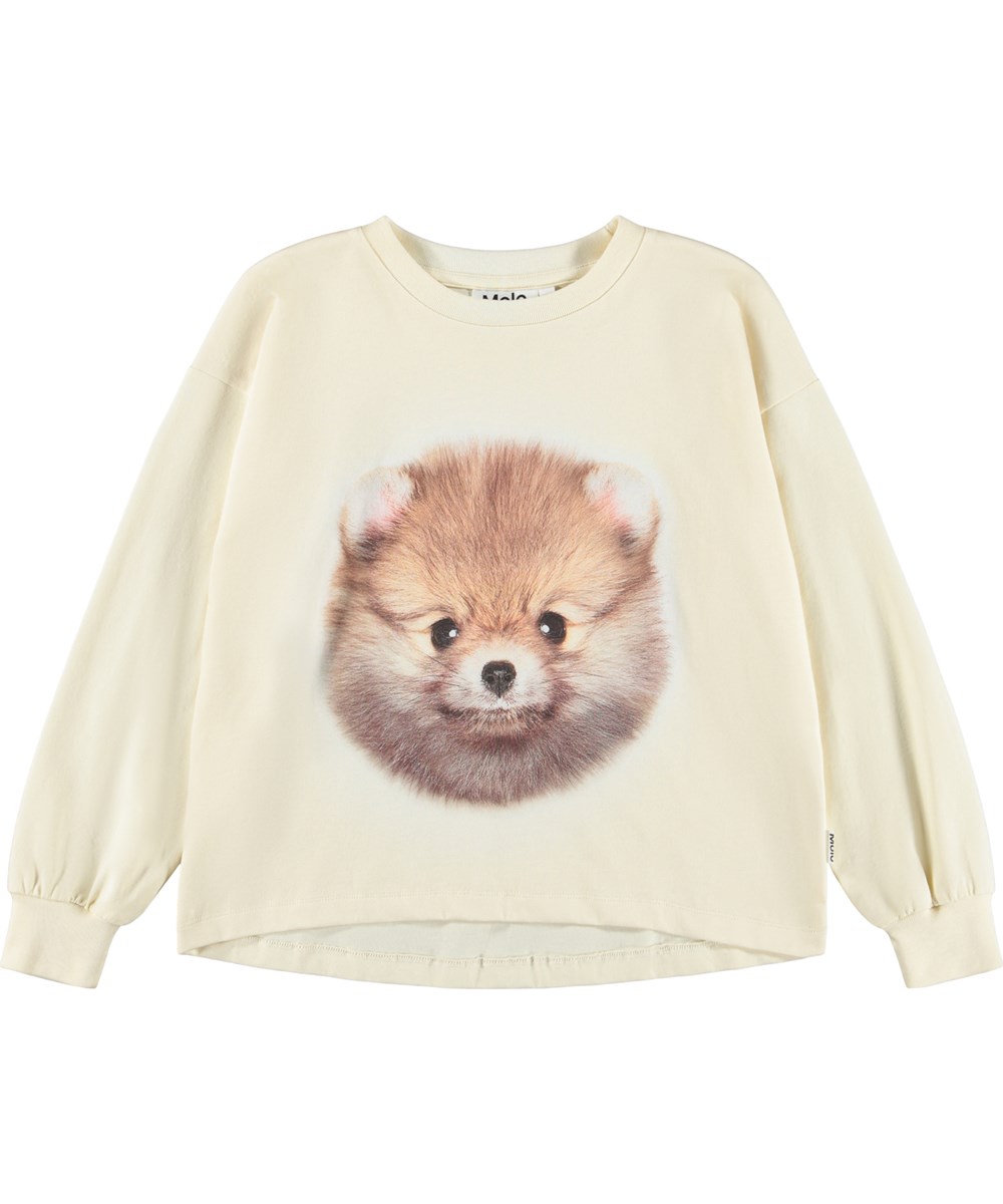 Reniza - POM Pomeranian - Off-white långärmad topp för barn i mjuk ekologisk bomull med muddar och halsringning med en pomeranianhund.