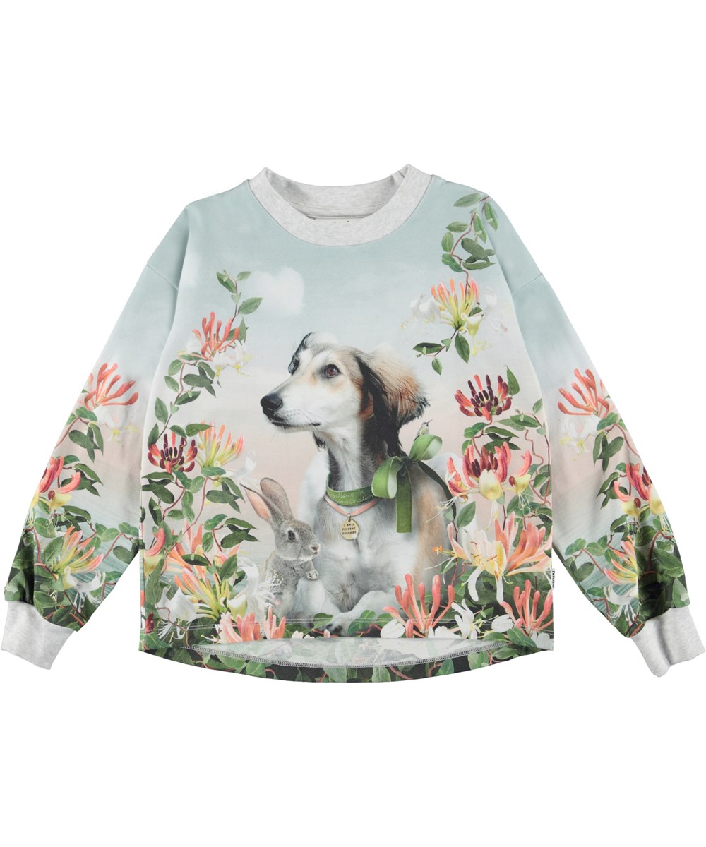 Reniza - Present Dreamers - Ekologisk tröja med kanin, hund och blommor.