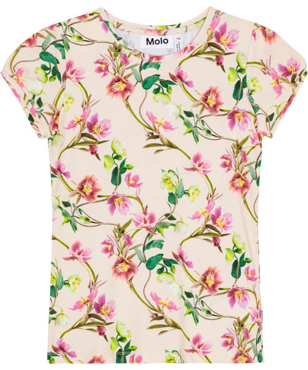 Rimona - Hellebore - T-shirt i ekologisk bomull med korta puffärmar och ett mönster i vitt och ljusrosa över hela.