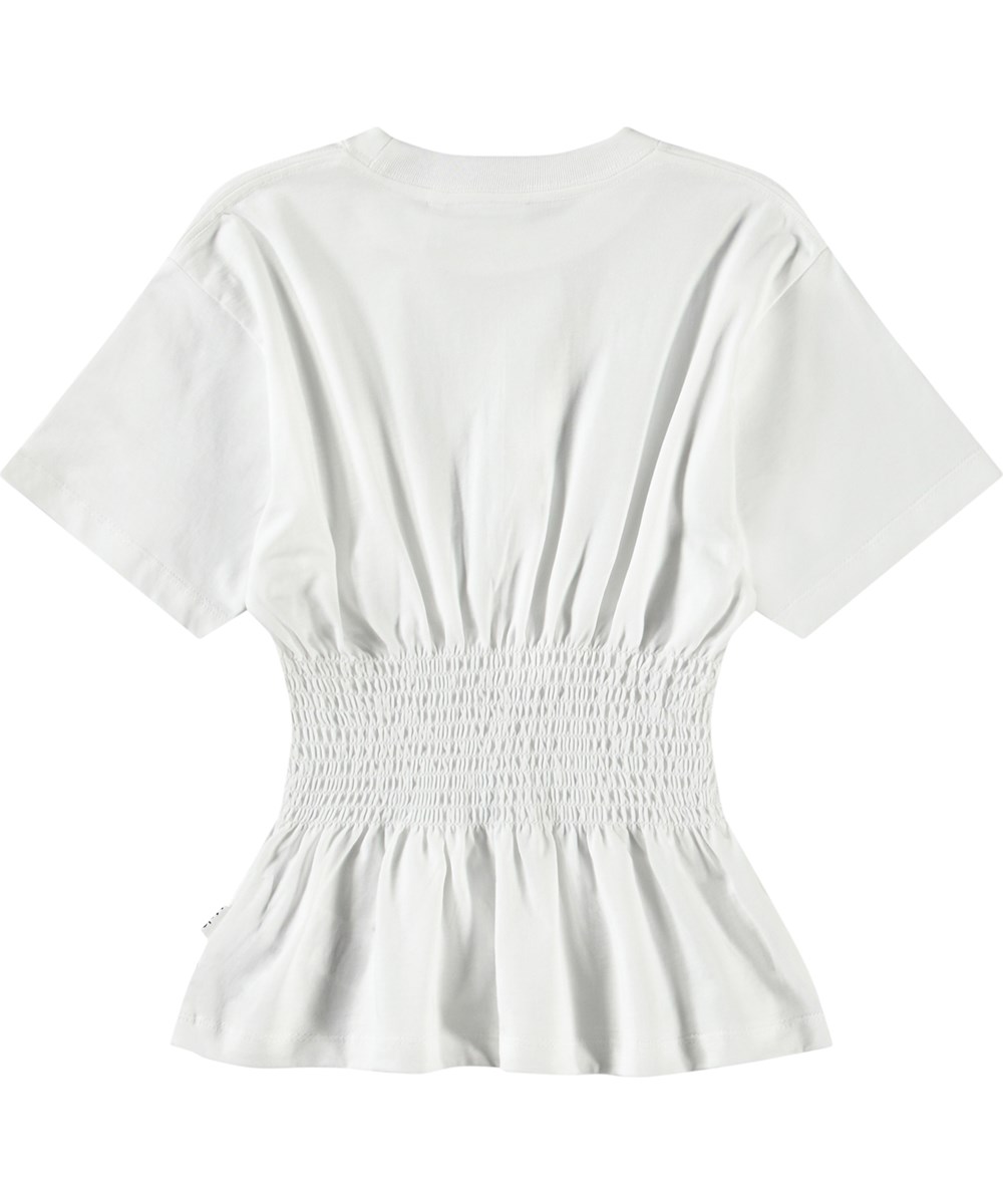 Ronalda - Crisp White - Vit T-shirt för barn i ekologisk bomull med korta ärmar, ribbad halsringning och smockeffekt.