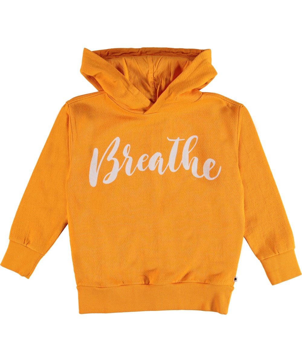 Madelyn - Orange Bloom - Gul blus med huva med text. 