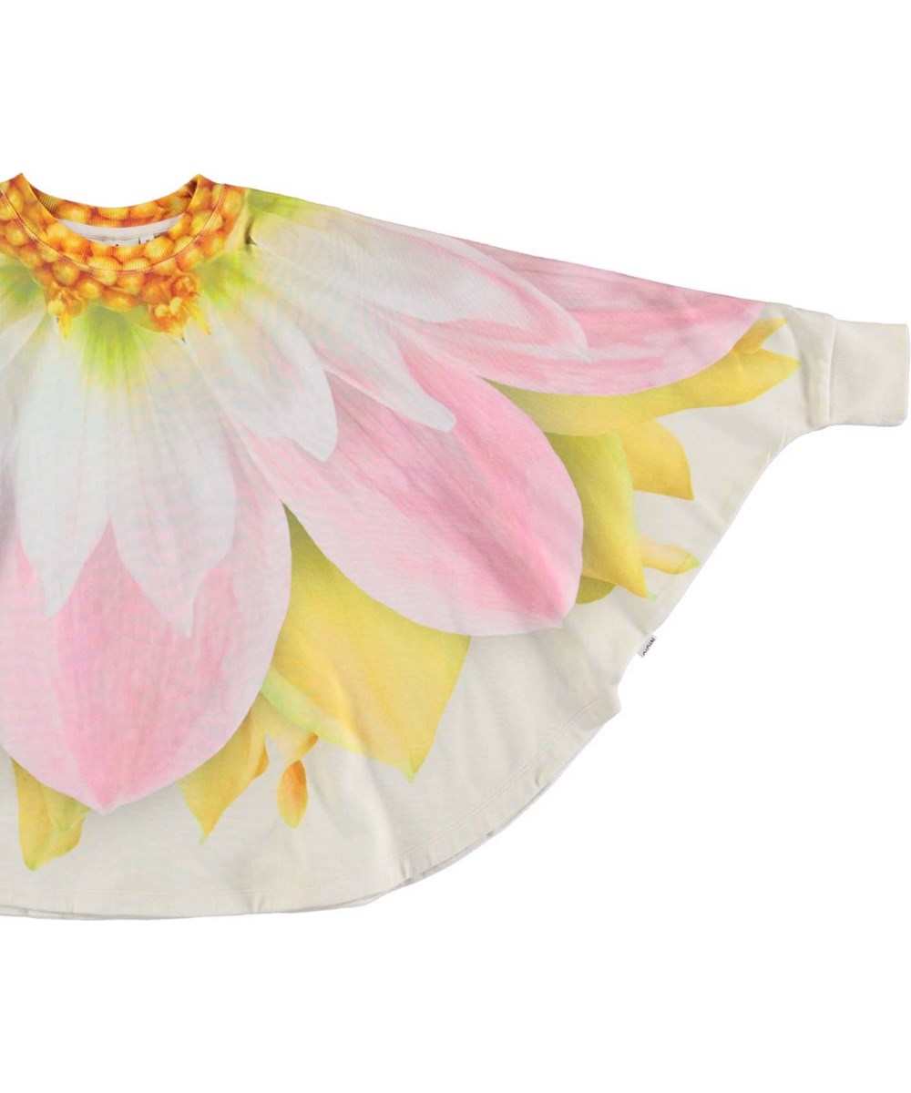 Marcella - Spring Bloom - Ekologisk vit pocho med blommor.