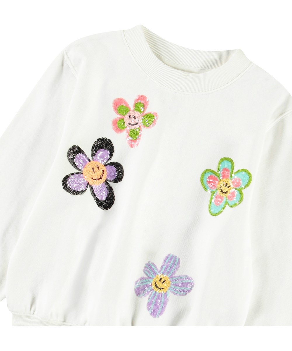 Marge - Joy Of Flowers - Vit sweatshirt med paljetter för barn i mjuk ekologisk bomull med ribbade kanter vid halsen, ärmar och nederkant på sweatshirten.
