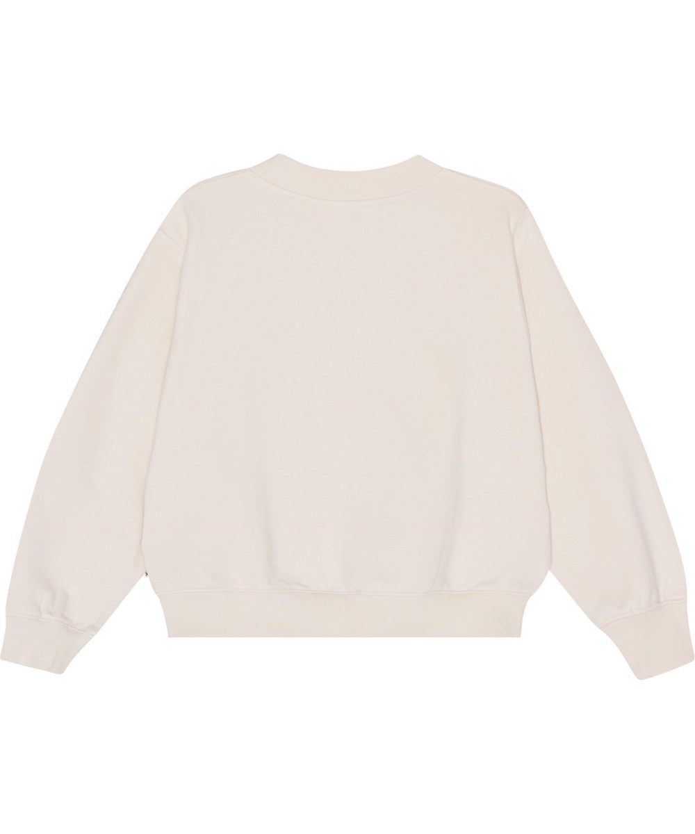 Marge - Sea Shell - Råvit sweatshirt i ekologisk bomull med texten "More Love". 