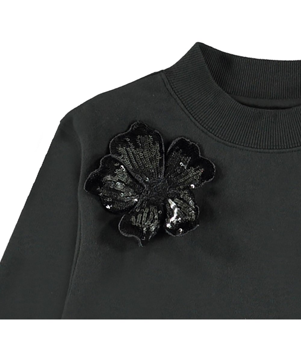 Marge - Space Grey - Mörkgrå sweatshirt med paljettblommor.