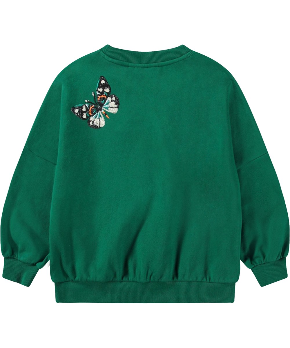 Marika - Aventurine - Mörkgrön sweatshirt i mjuk ekologisk bomull med multifärgade paljetter broderade som fjärilar.