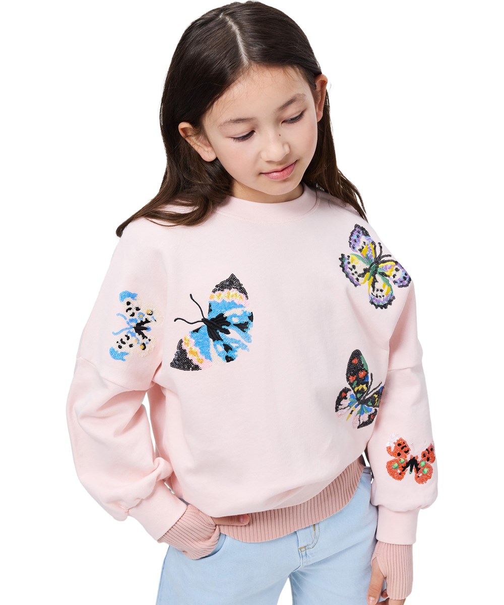 Marika - Cloud Pink - Rosa sweatshirt för barn med paljettbroderi i ekologisk bomull