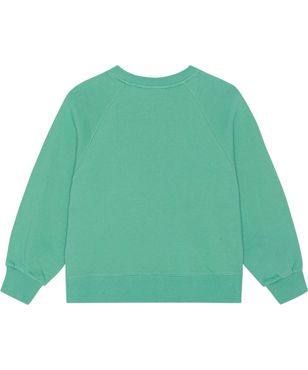 Marilee - Chalk Green - Grön sweatshirt i ekologisk bomull med regnbåge i paljetter.
