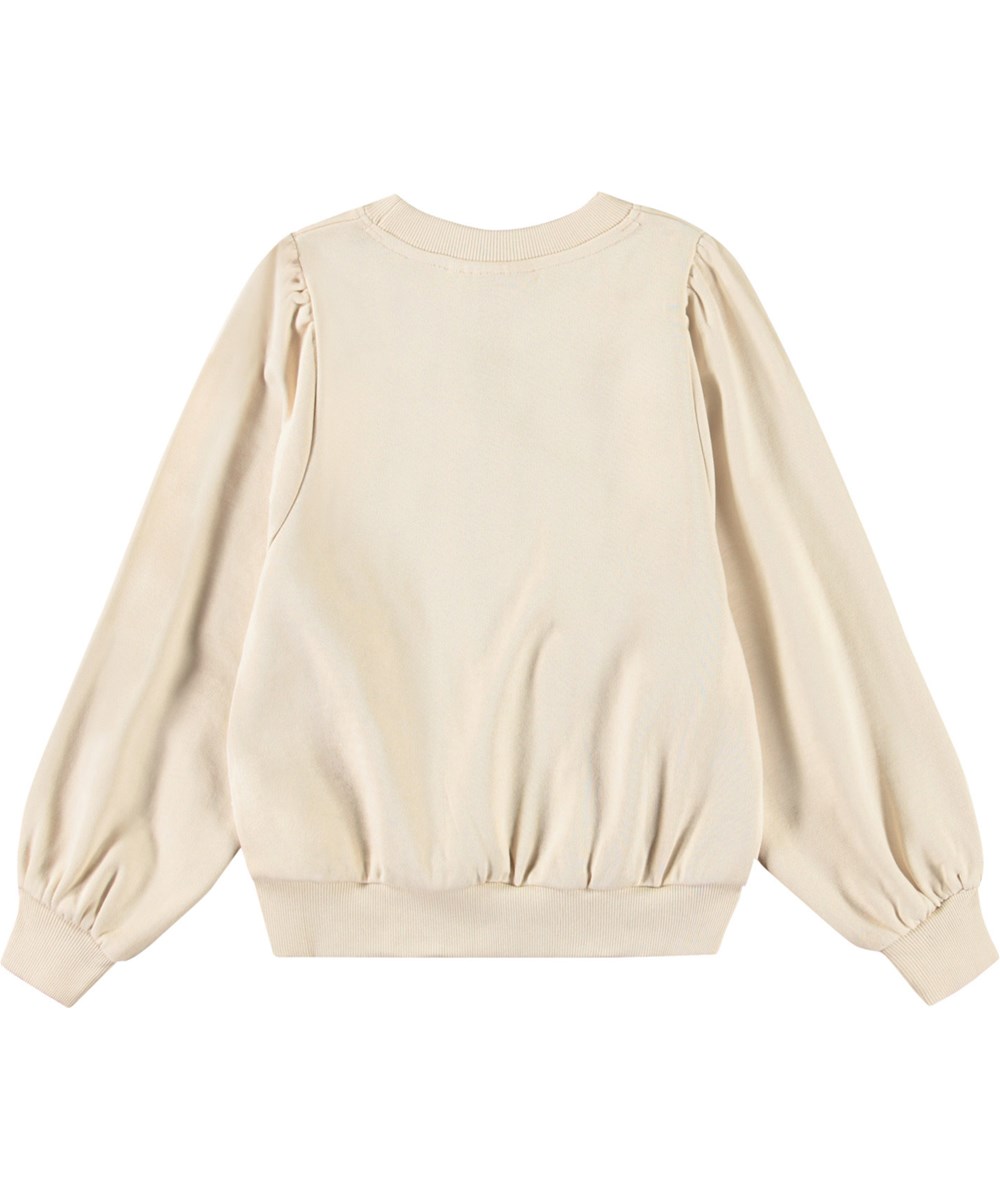Mary - Brazilian Sand - Beige tröja med blommig brodyr för barn i mjuk ekologisk bomull med ribbade kanter vid halsen, ärmar och nederkant på tröjan.