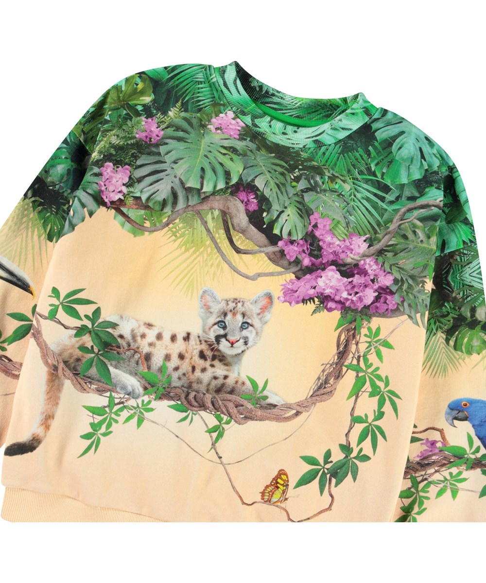 Maxi - Pumatastic - Ljusorange tröja med tryck för barn i mjuk ekologisk bomull med ribbade kanter vid halsen, ärmar och nederkant på tröjan.