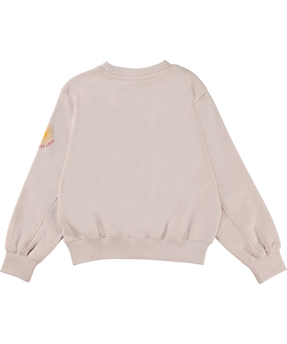 Maxime - Powder - Rosa ekologisk sweatshirt med klistermärken.