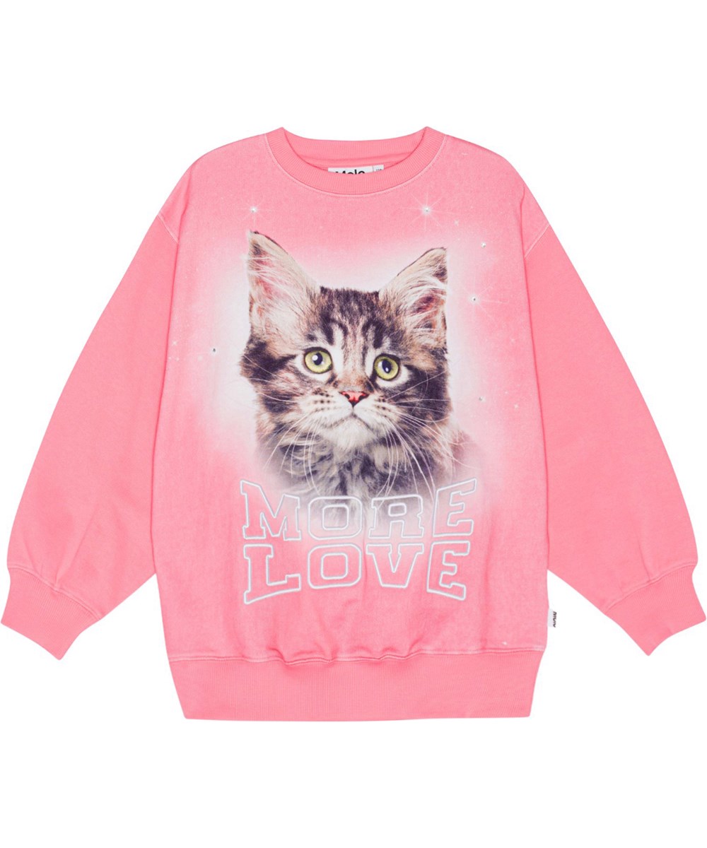 Monti - More Love Cat - Rosa sweatshirt i ekologisk bomull med ett stort kattmönster och texten "More Love"