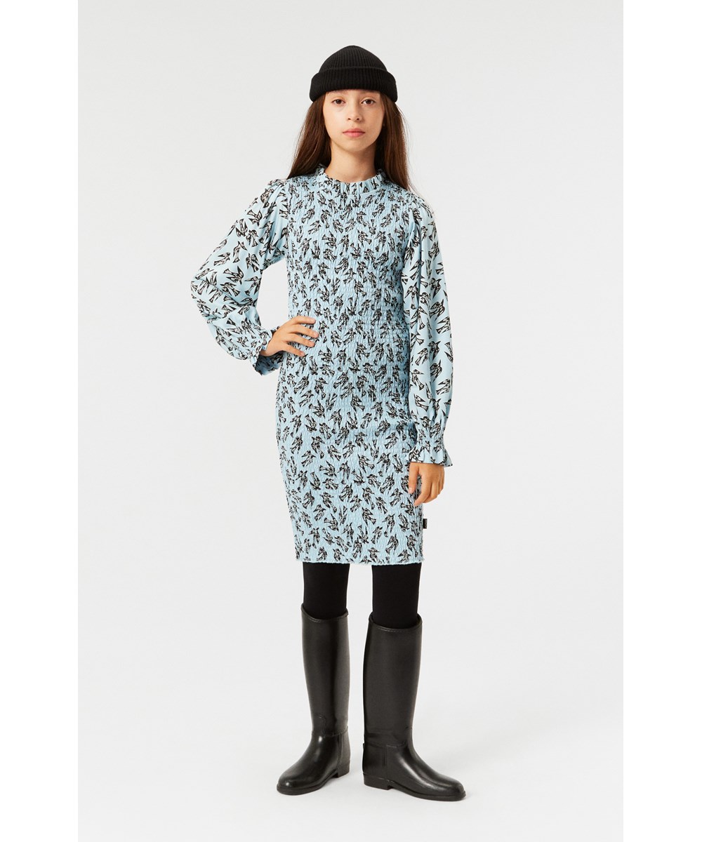 Calesta - Blue Studio Birds - Light blue knee-length dress in soft viscose with smocking, bird print.