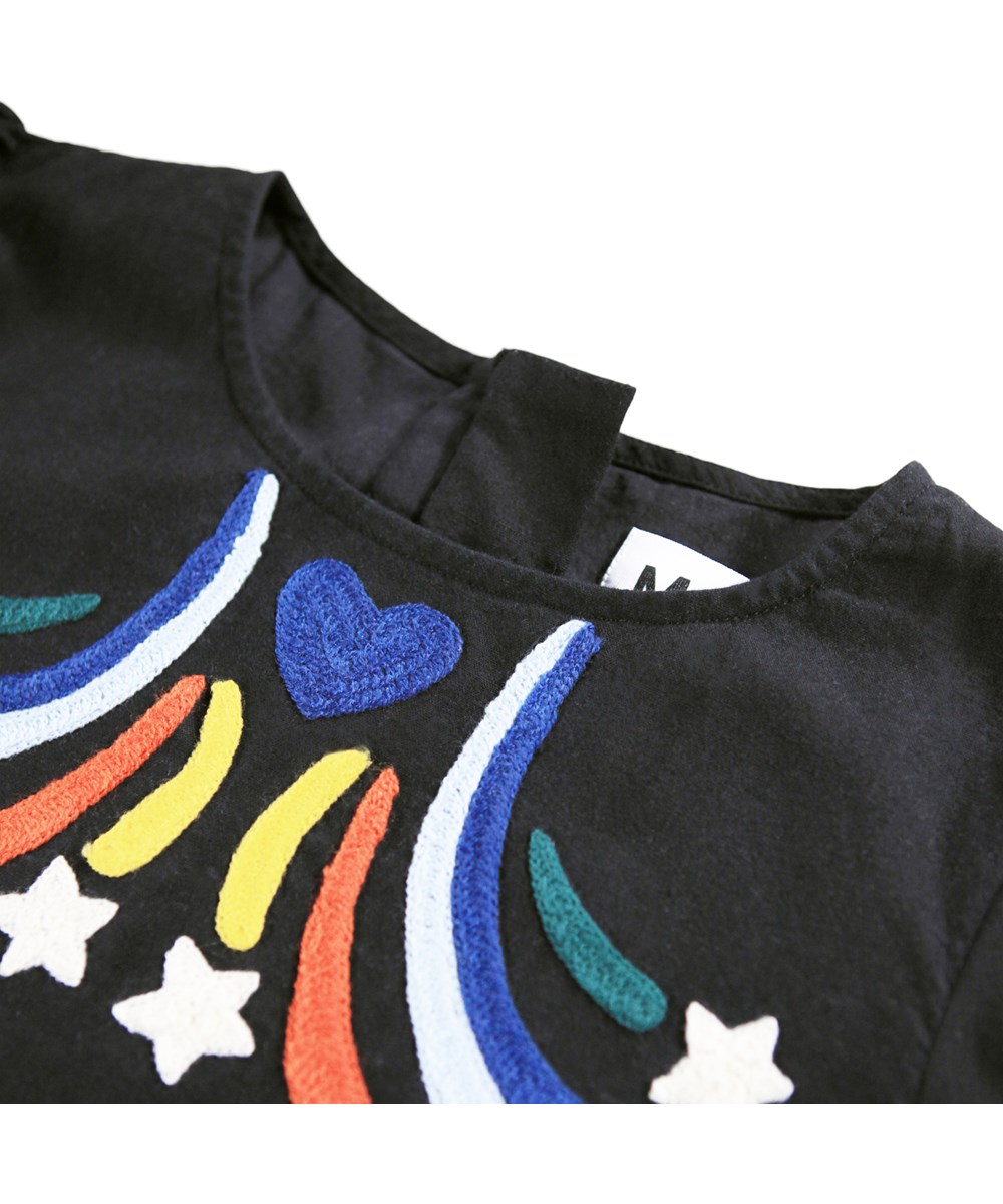 Camma - Shooting Star - Knee-length black dress for children made of cotton with embroidered shooting stars and ice crystals.