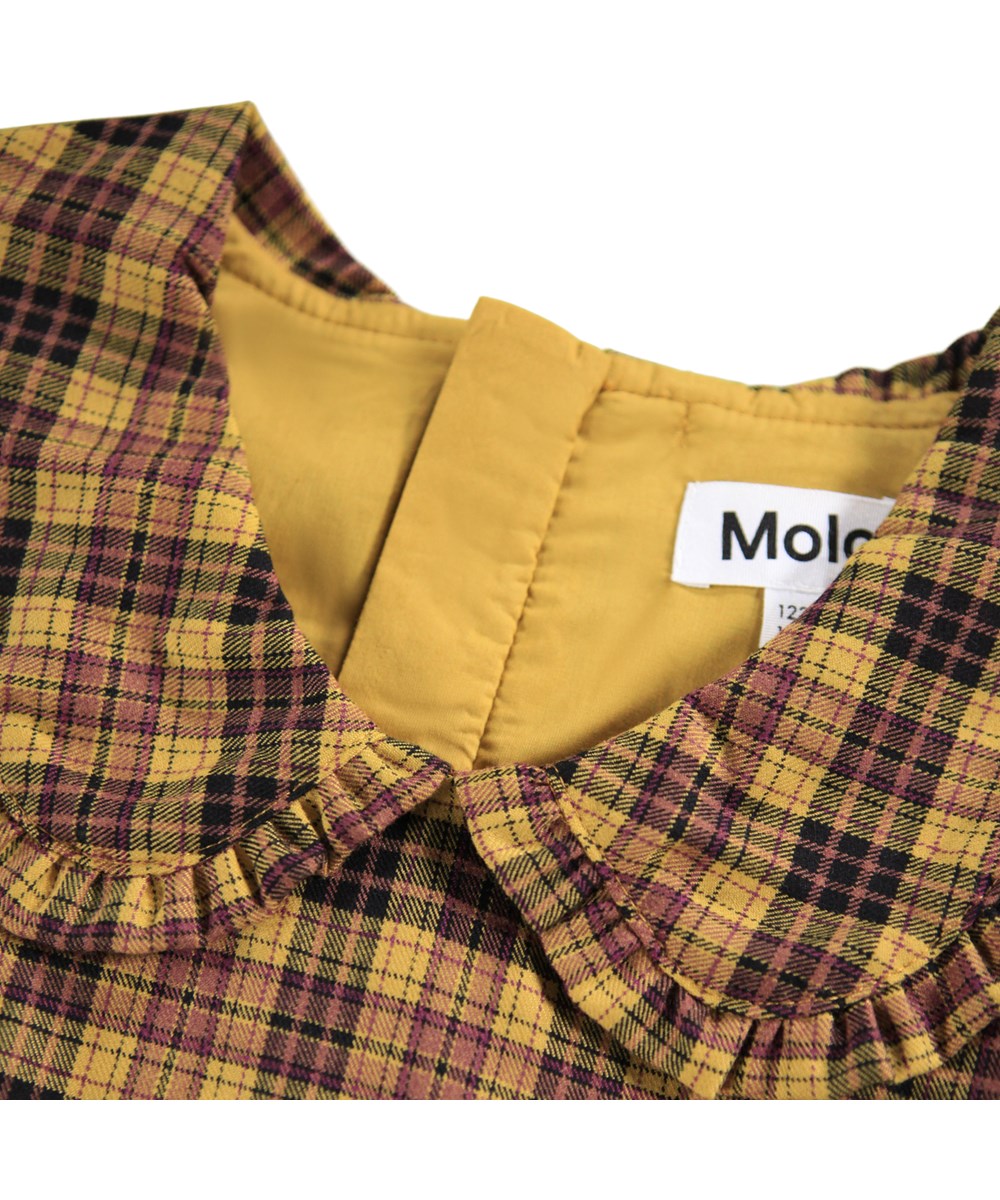 Candice - Highland Check - Long-sleeved short dress for children in yellow and brown check.