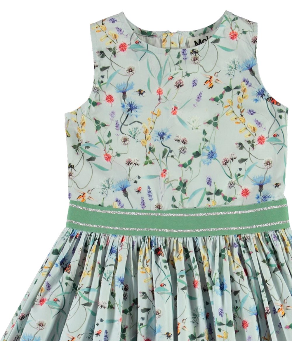 Carli - All Small Things - Light blue organic dress with wild flowers 