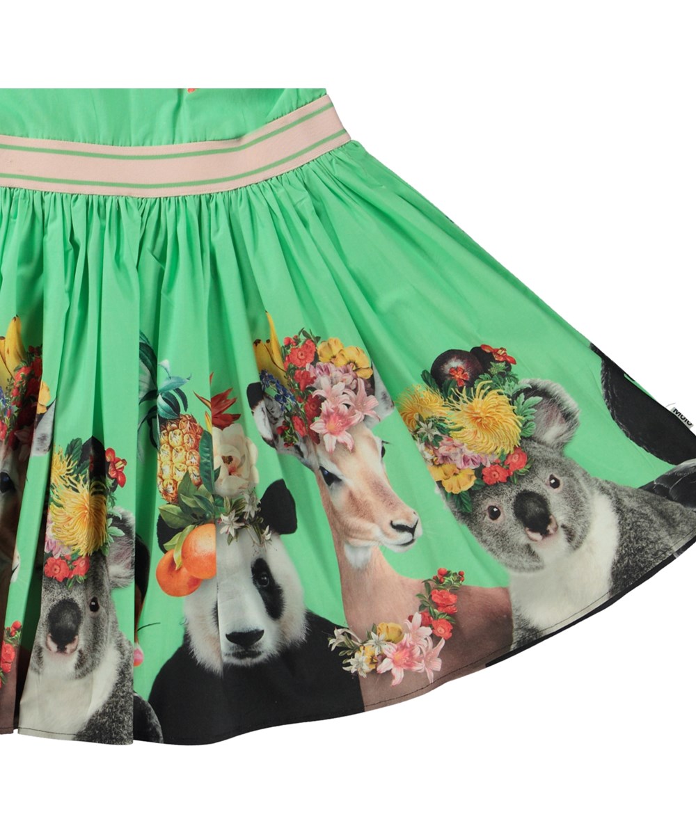 Carli - Fruitilicious - Green organic sleeveless dress with tropical animal print