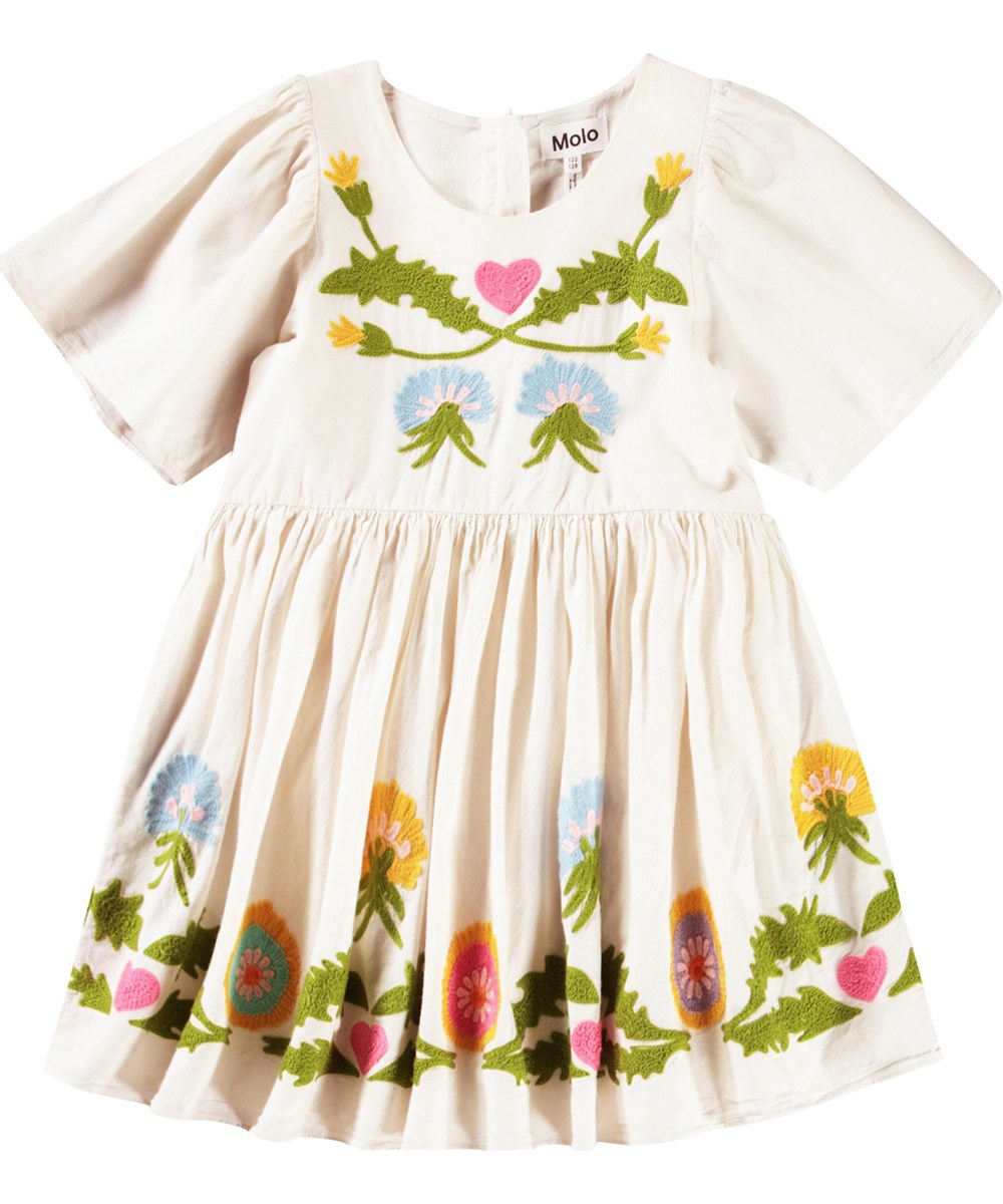 Carlin - Dandelion Border - Off-white knee-length dress for children in a soft cotton with a round neckline and butterfly sleeves.