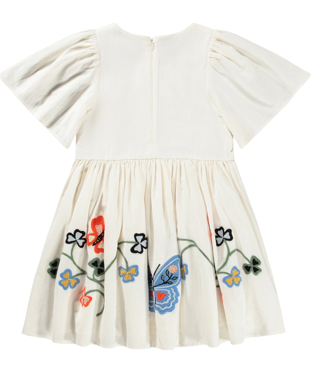 Carlin - Nature Border - Off-white dress for children made of organic cotton with a butterfly embroidery