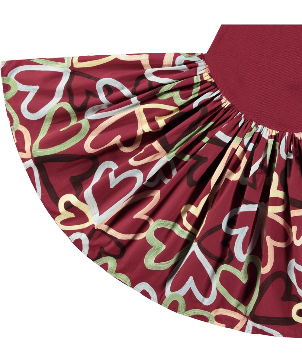 Casie - Flutters Of Love - Bordeaux dress in organic cotton with hand-painted heart print.
