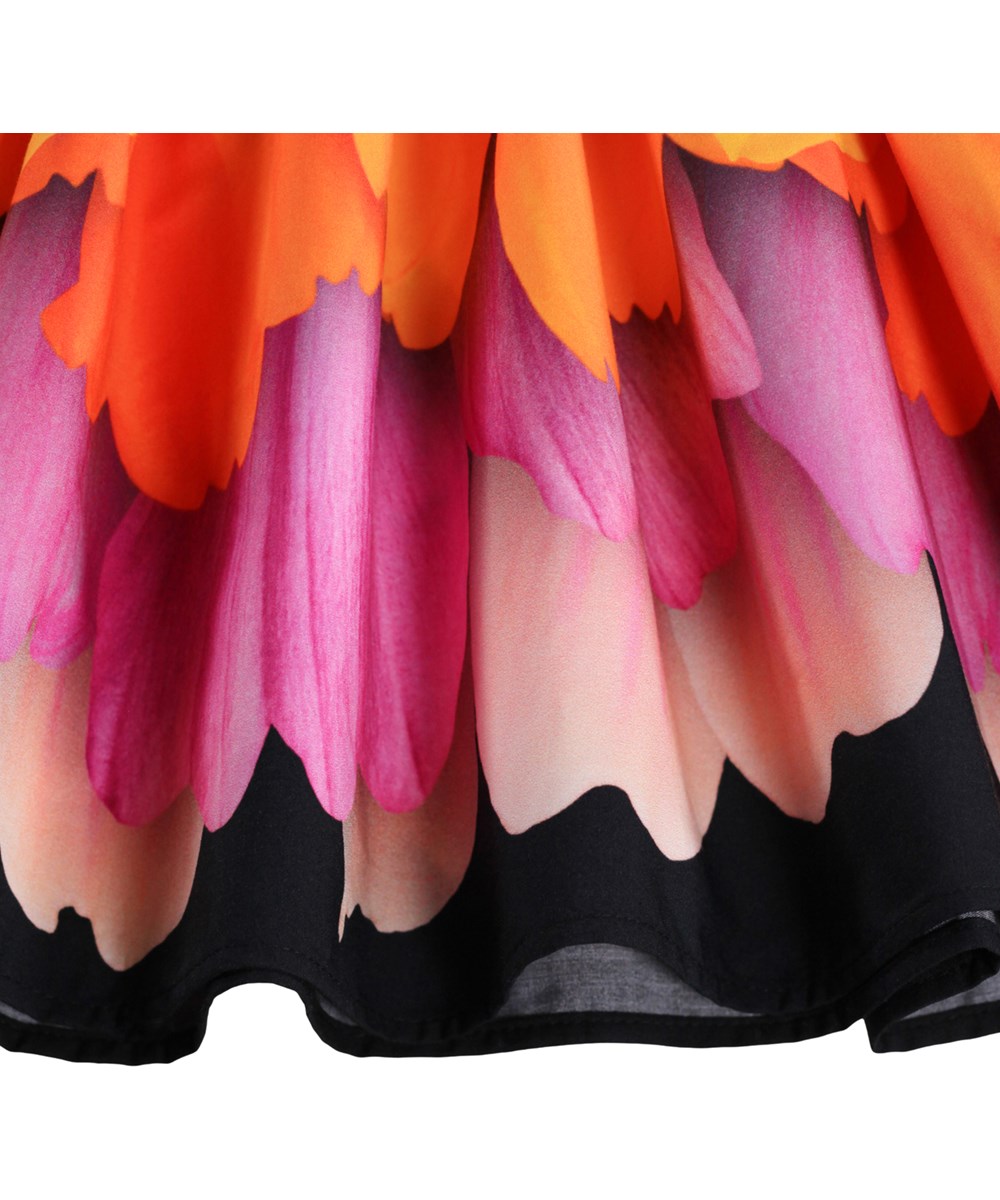 Casie - Rainbow Petals - Black dress for children made of soft, organic cotton with long sleeves 