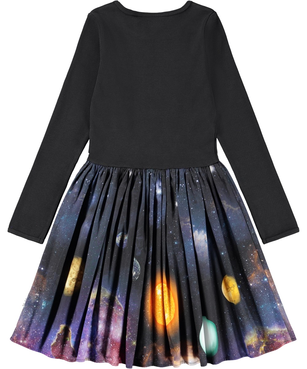 Casie Warm - Made Of Stardust - Long-sleeved black dress for children made of organic cotton with a skirt made of brushed cotton flannel.