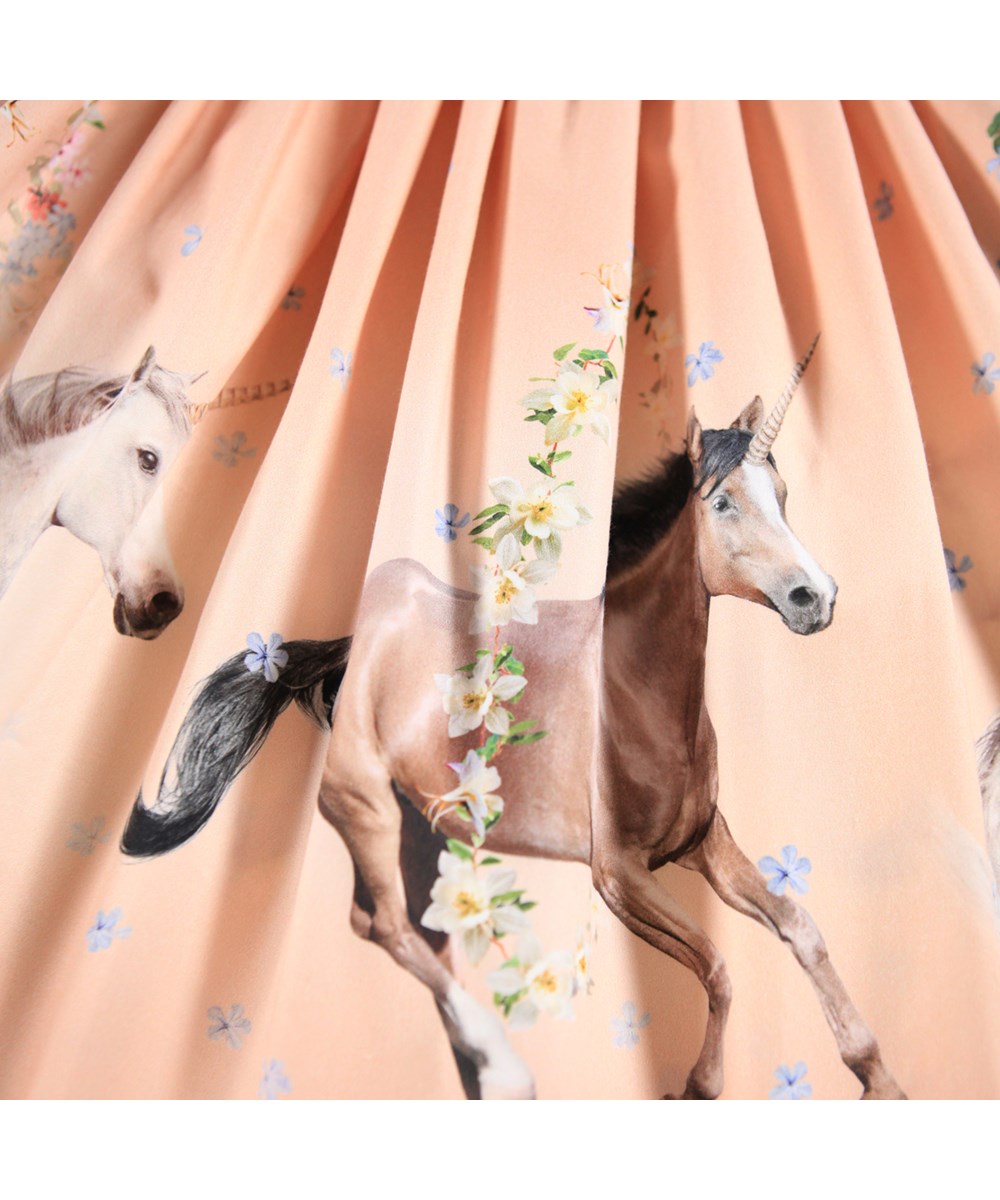 Casie Warm - Universal Flora - Long-sleeved cream-coloured dress for children made of organic cotton with a skirt made of brushed cotton flannel.