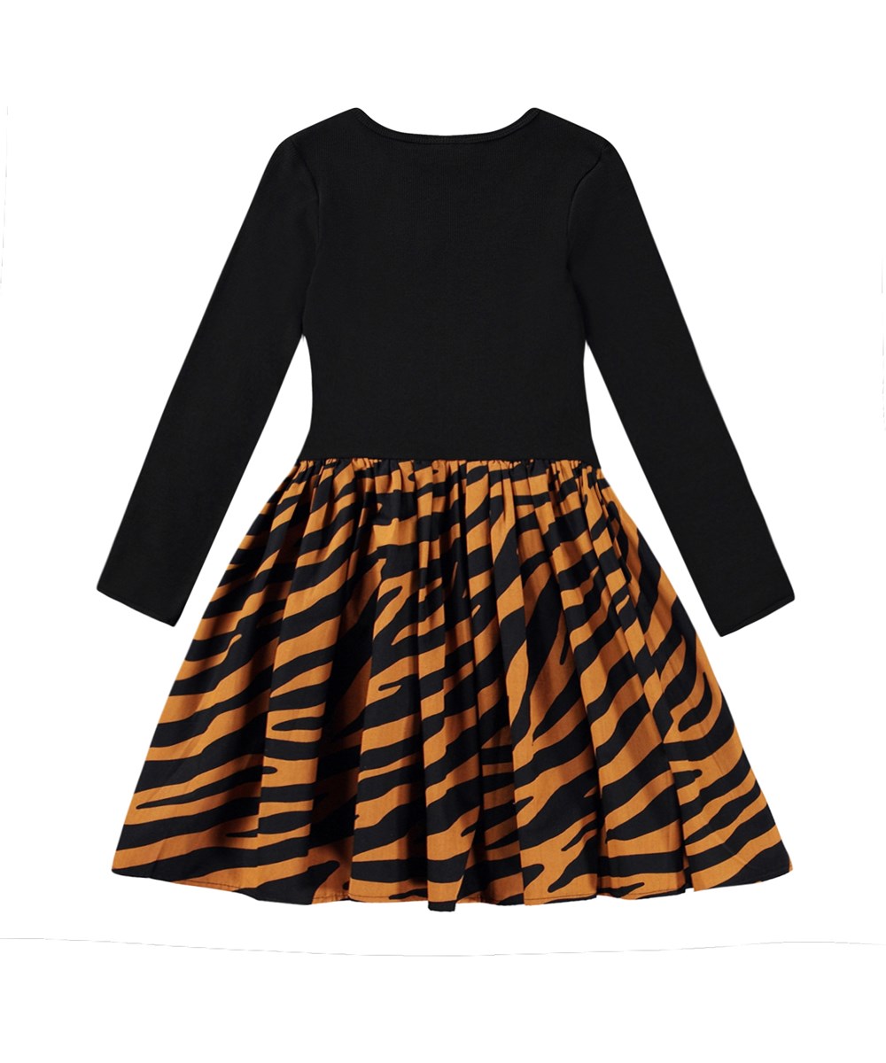 Casie - Zebra Denim - Black organic cotton dress with a circle skirt in zebra stripes.