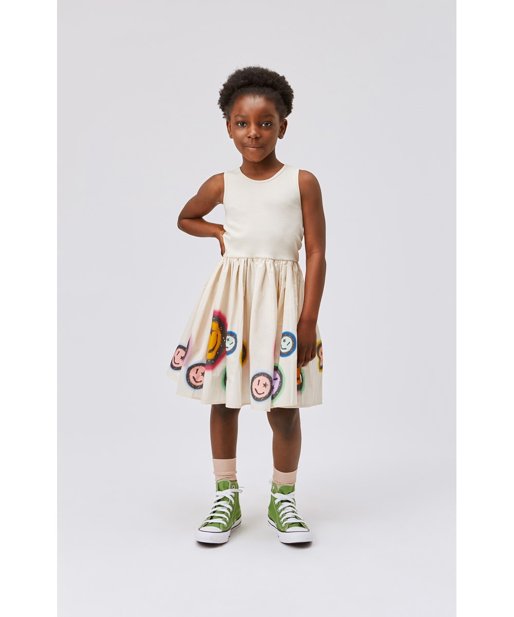 Cassandra - Space Rainbow - Off-white organic dress with poplin skirt smiley faces