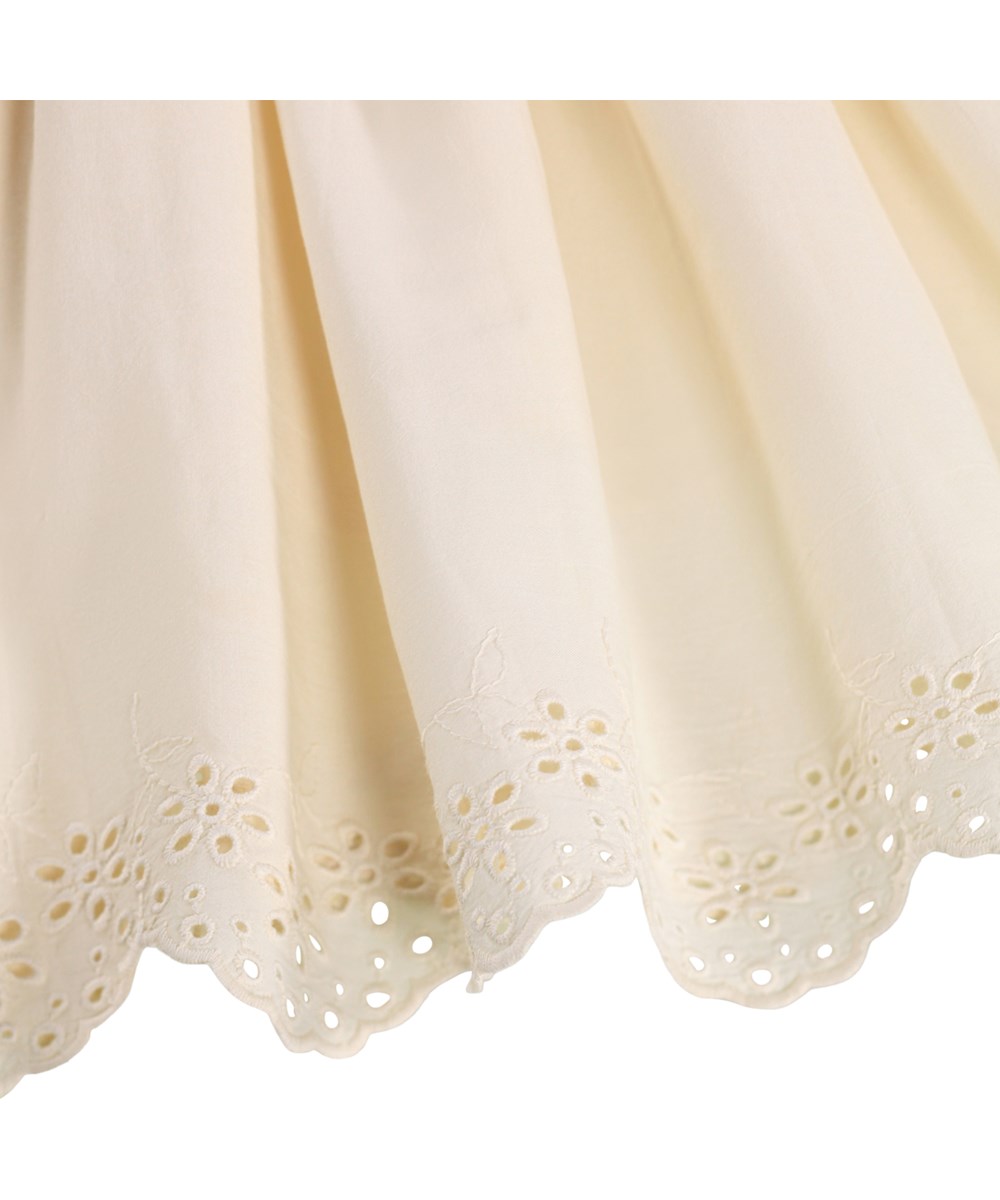 Caya - Pearled Ivory - Off-white dress for children made of organic cotton with broderie anglaise
