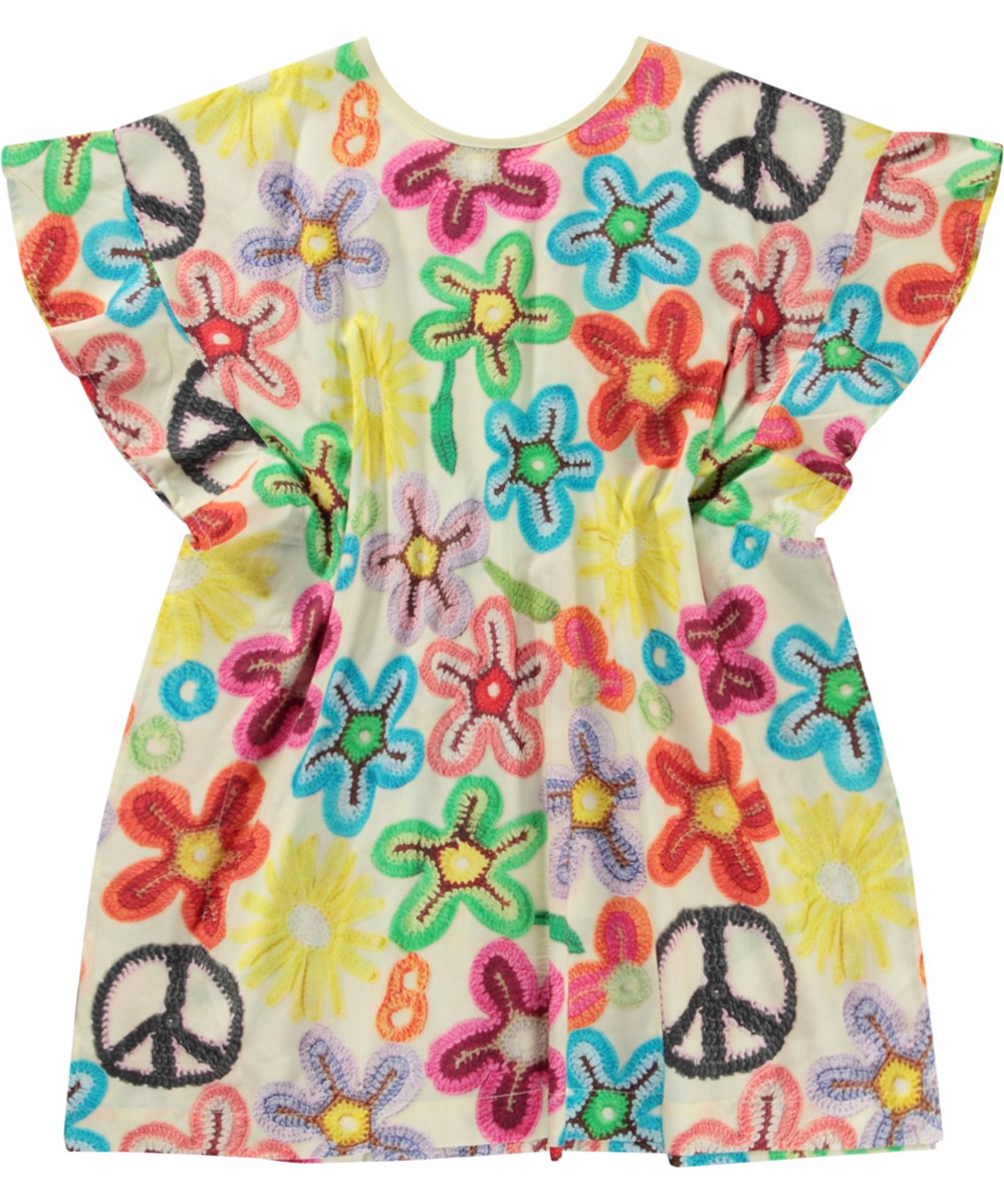 Cayla - Flower Peace - Tunic in organic cotton with a print of crocheted flowers and a peace sign
