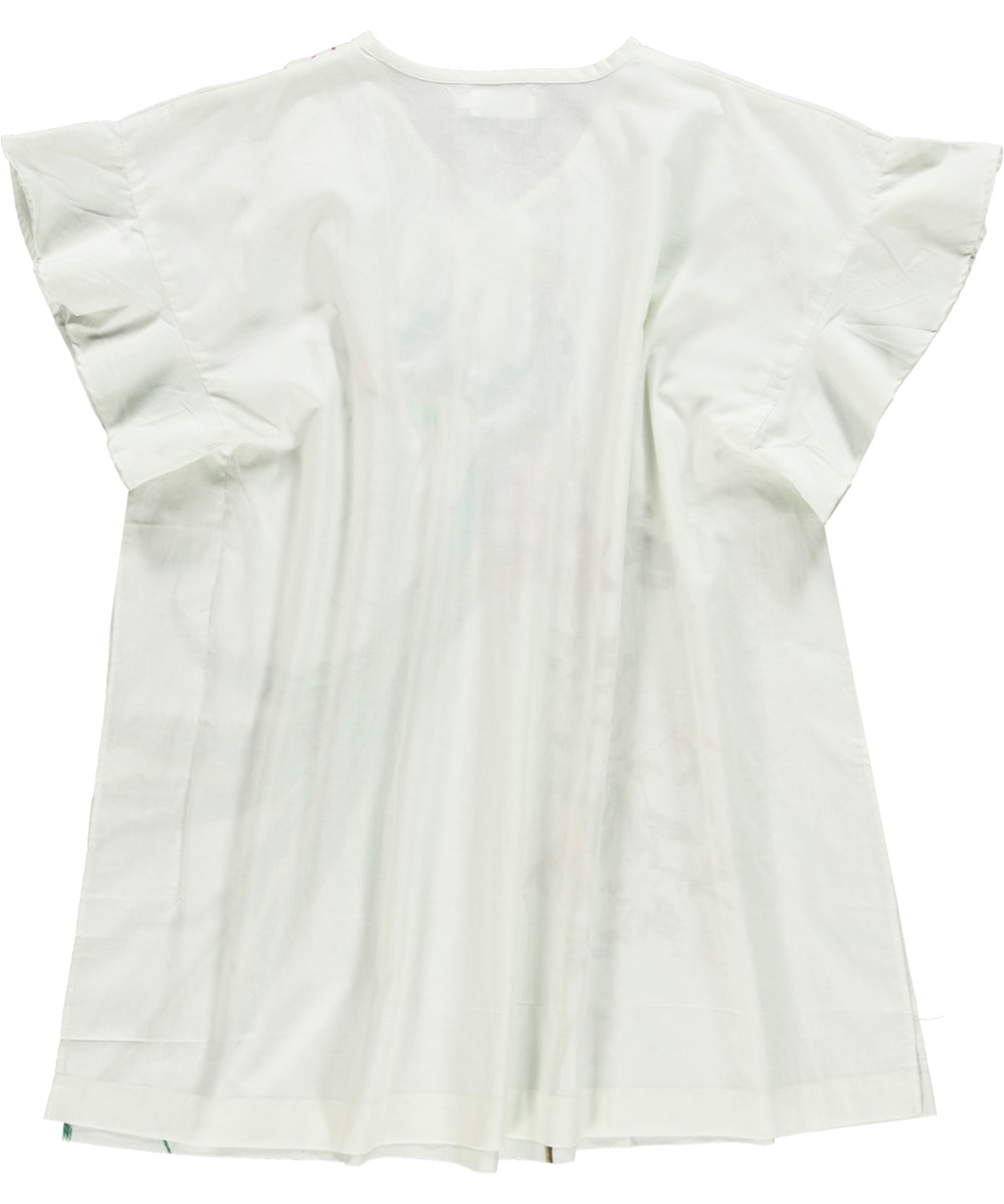 Cayla - Paradise Bird - White organic tunic with ruffle sleeves and bird print 