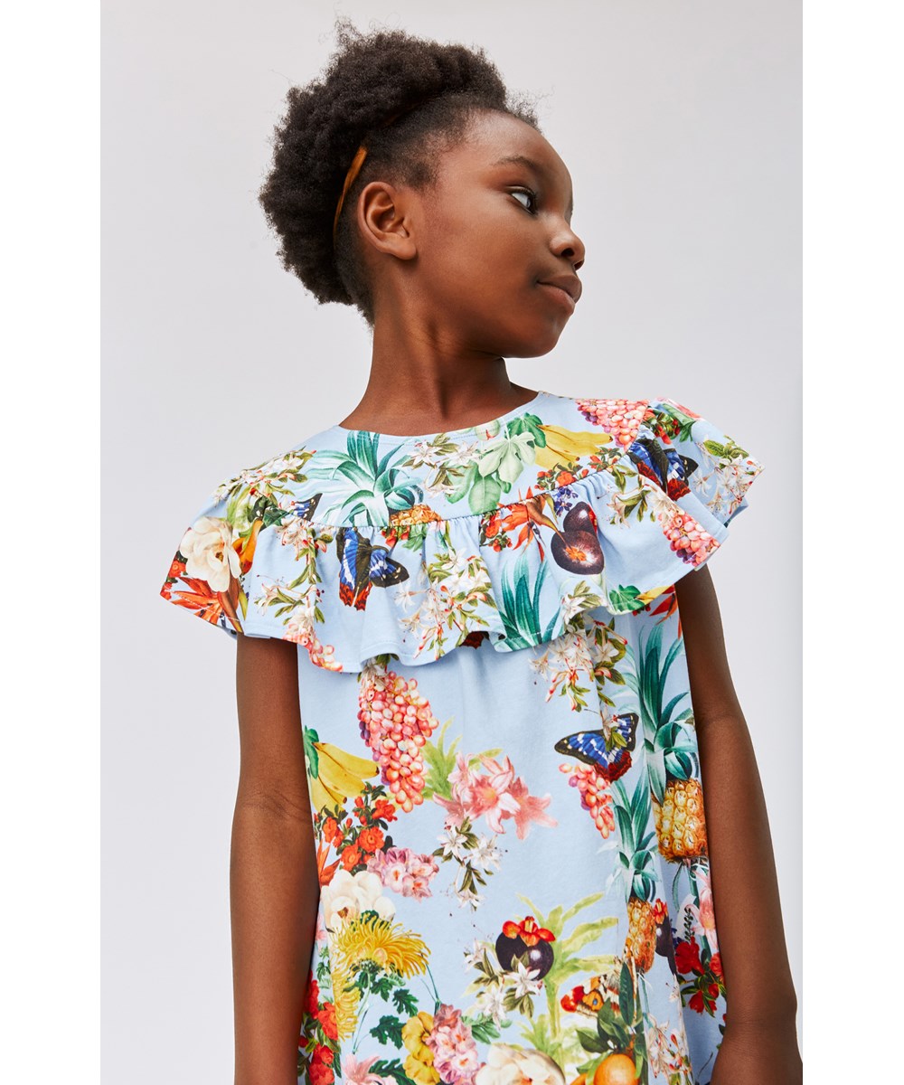 Celia - Tropical Fruits - Short sleeve, organic  jersey dress with all over tropical print