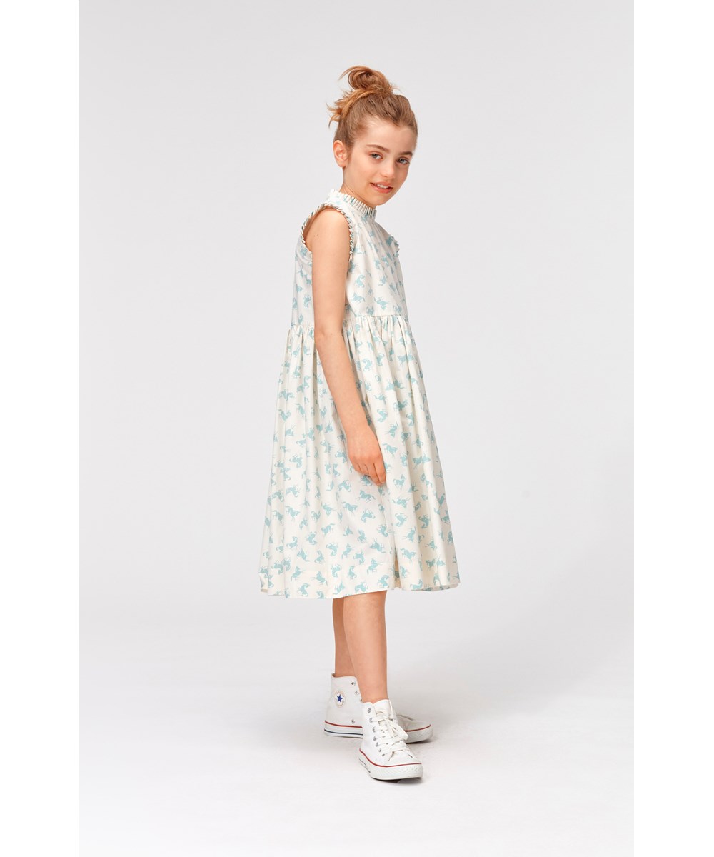 Charlette - Mini Horse Blue - White organic cotton dress with light blue horses 