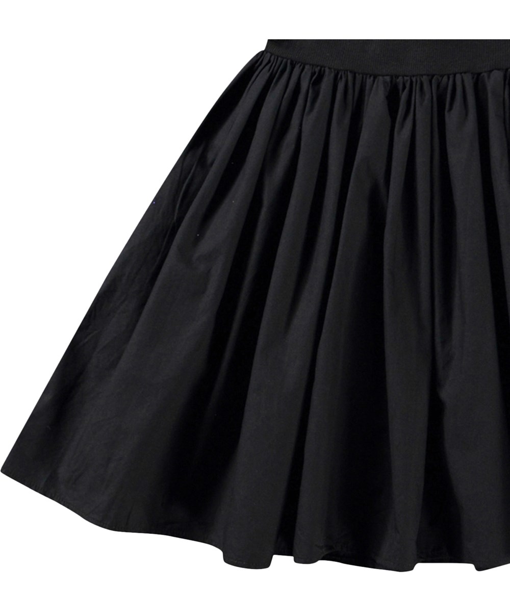 Chloey - Black - Black dress for children made of organic cotton with ruffles