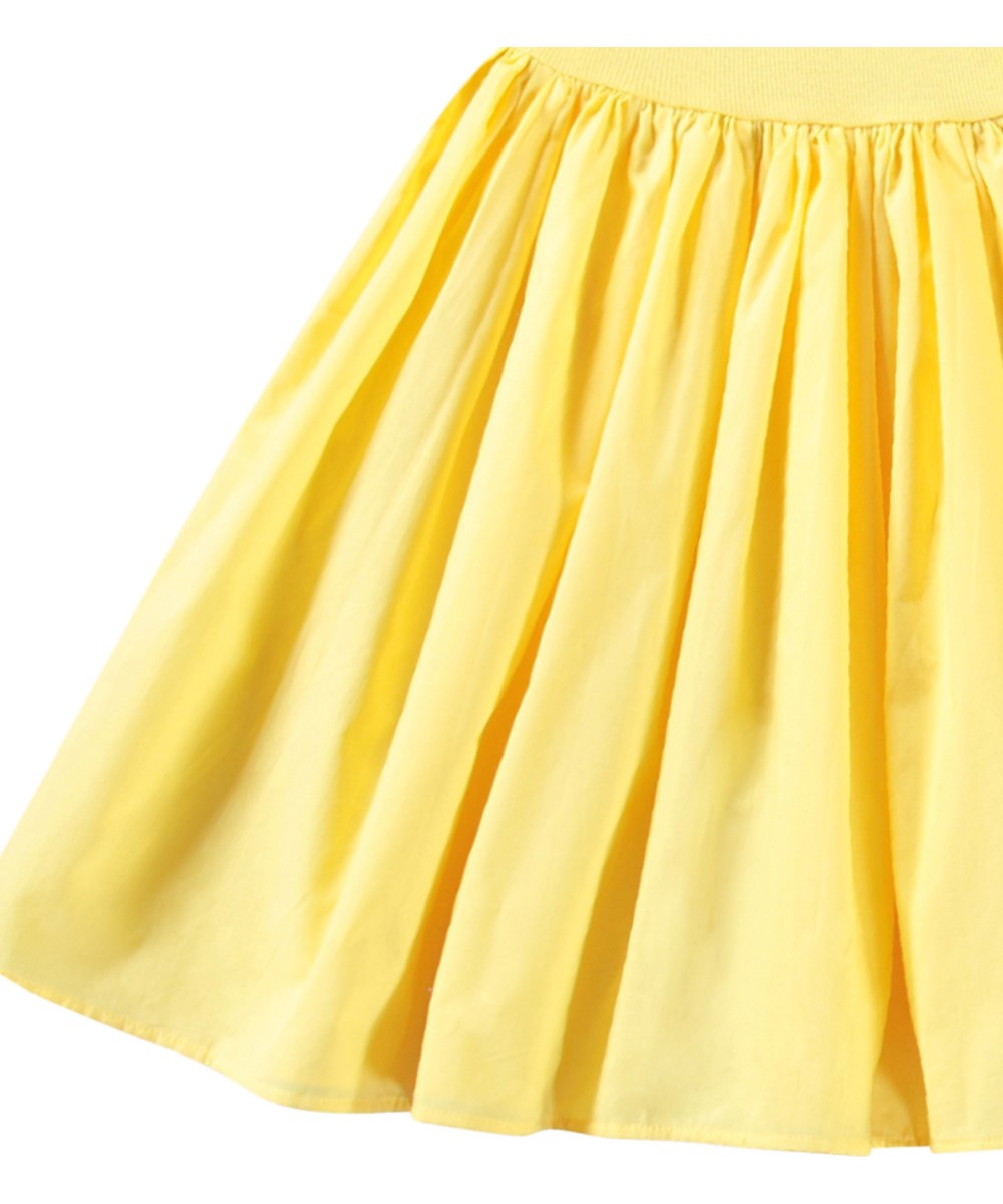 Chloey - Sunbright - Yellow one-shoulder dress in organic cotton with a wide poplin ruffle.