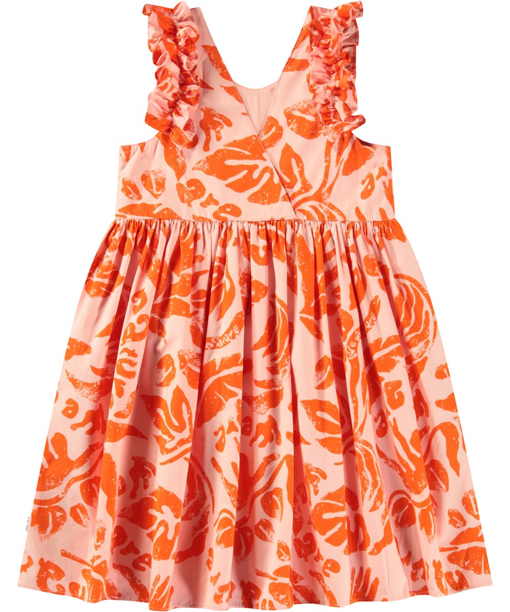 Cicely - Peachy Nature - Light orange knee-length dress for children in organic cotton with ruffle trim at the armholes.