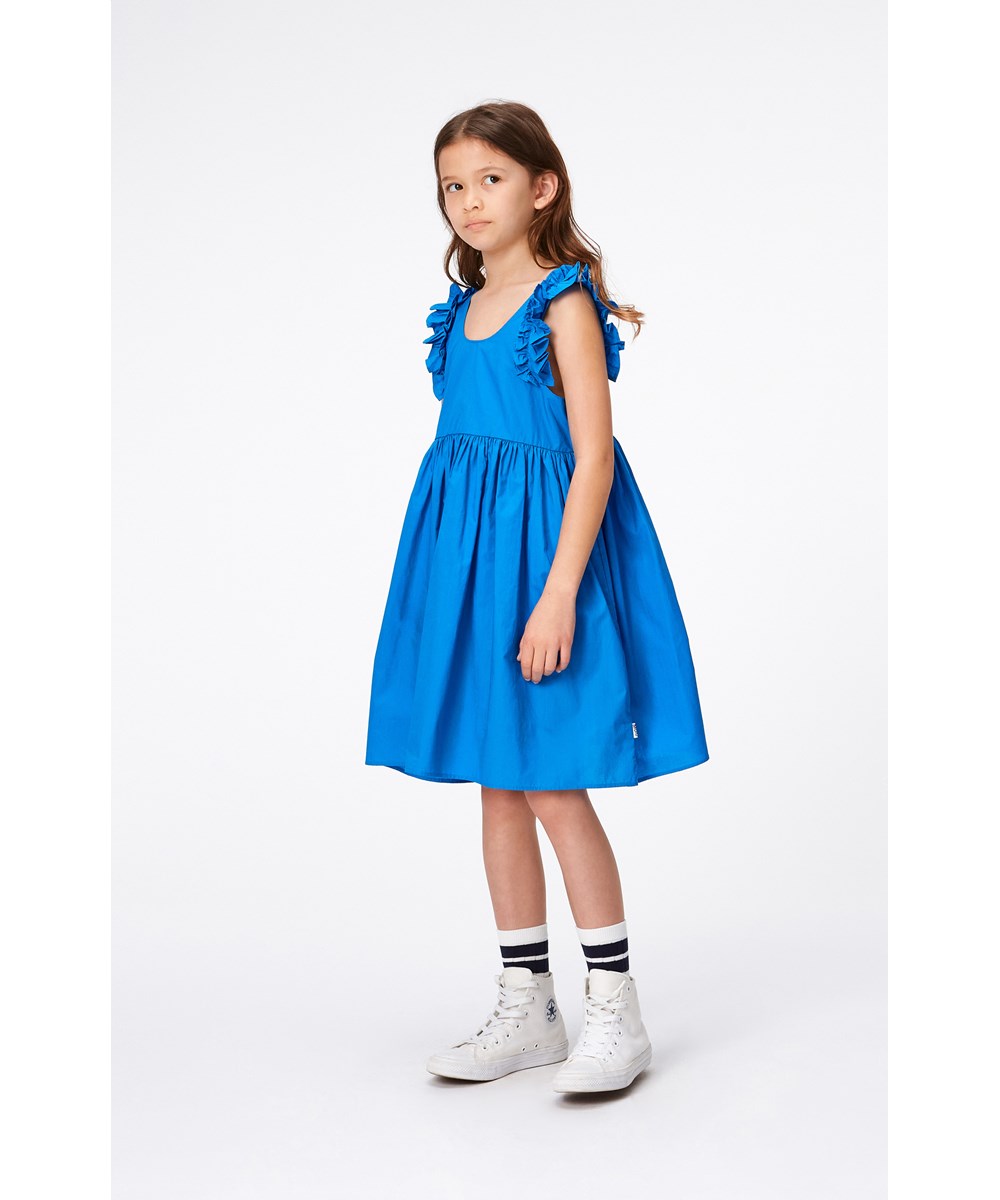 Cicely - Retro Blue - Blue dress in organic cotton with ruffle sleeves 