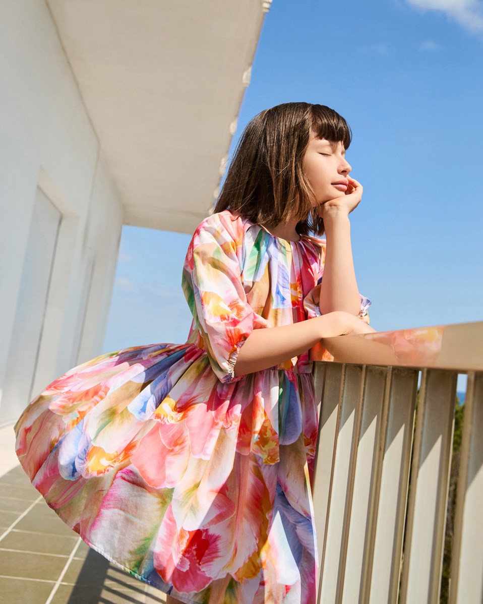 Ciera - Be A Tulip - Multicoloured floral dress for children in organic cotton with pleats around the neckline.
