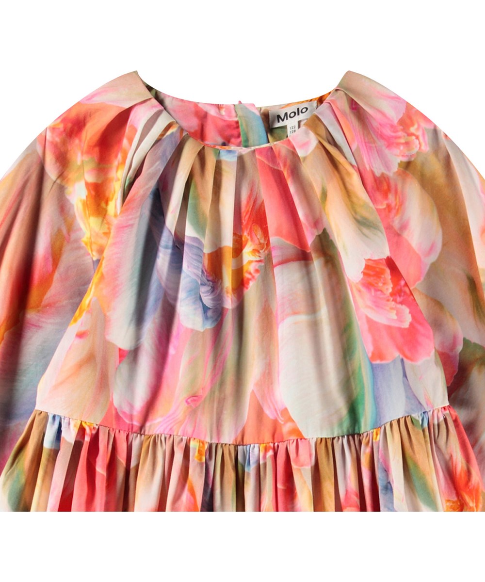 Ciera - Be A Tulip - Multicoloured floral dress for children in organic cotton with pleats around the neckline.