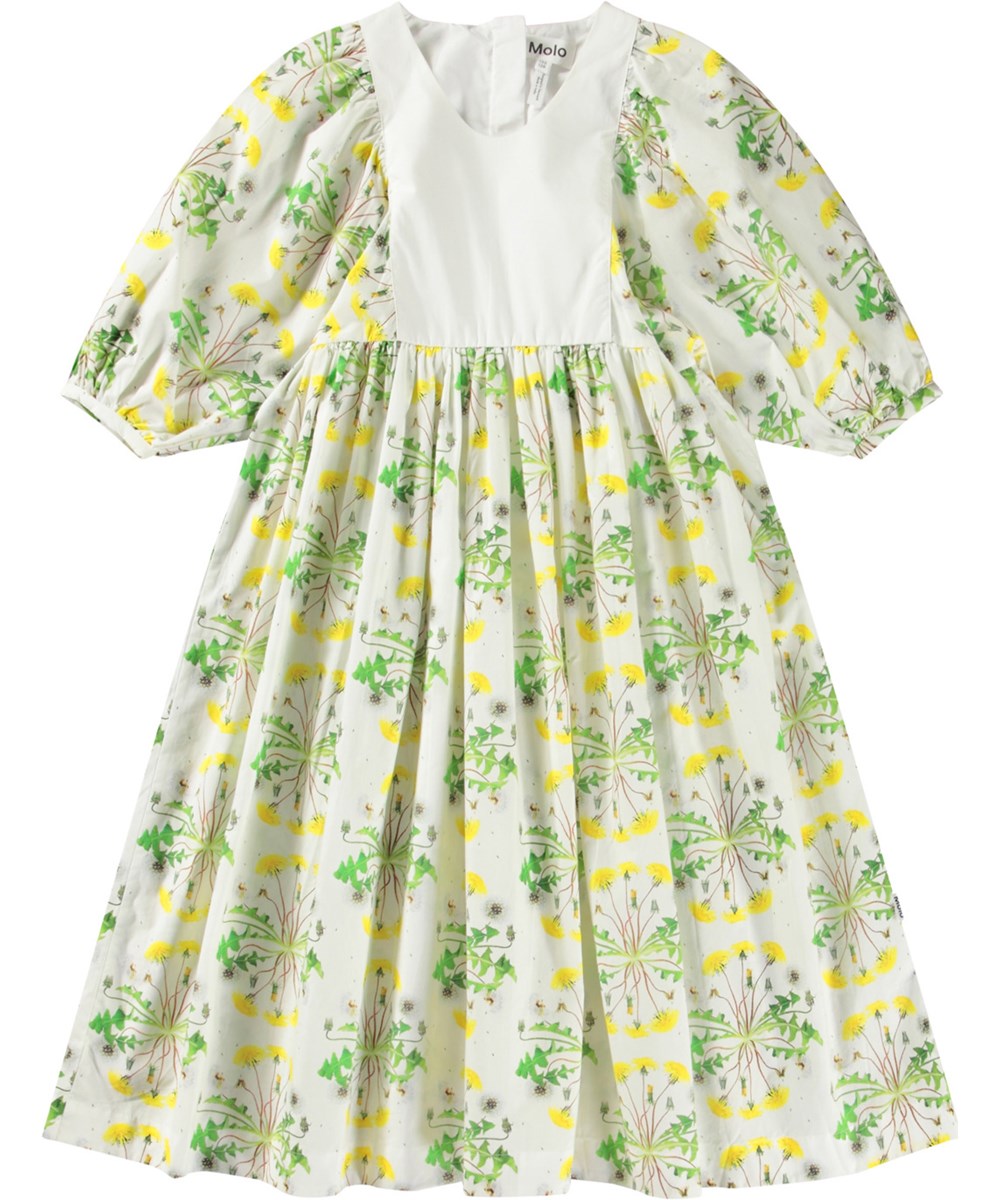 Cinzia - Dandelion Dotty - White dress for children in organic cotton with round neckline and puffed sleeves with button.