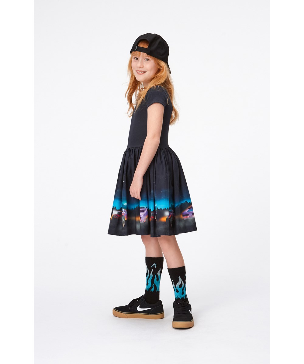 Cissa - Flame Car - Black dress in organic cotton with car print 