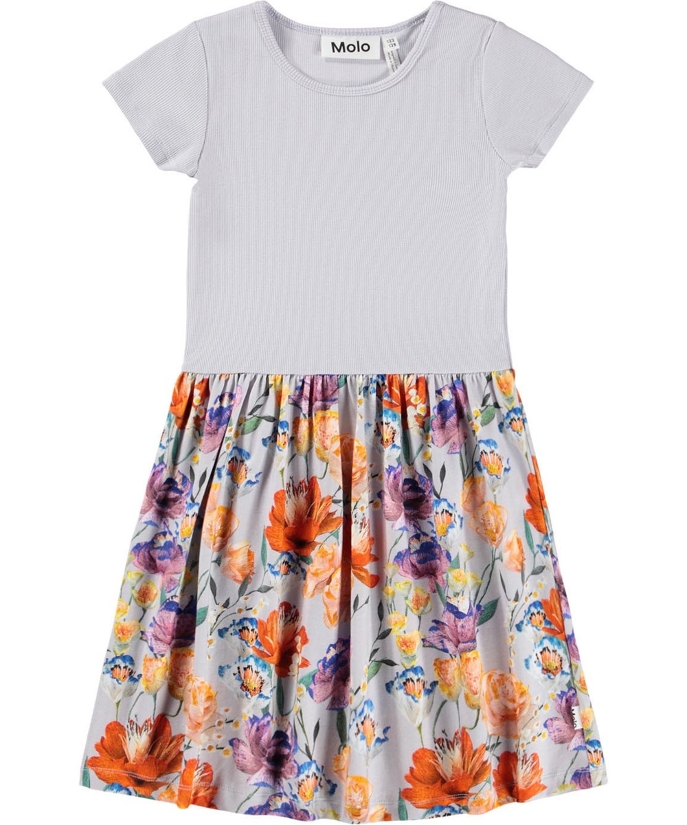 Cissa - Paper Flowers - Short-sleeved light purple dress  for children made of organic cotton with a print of flowers on the skirt.