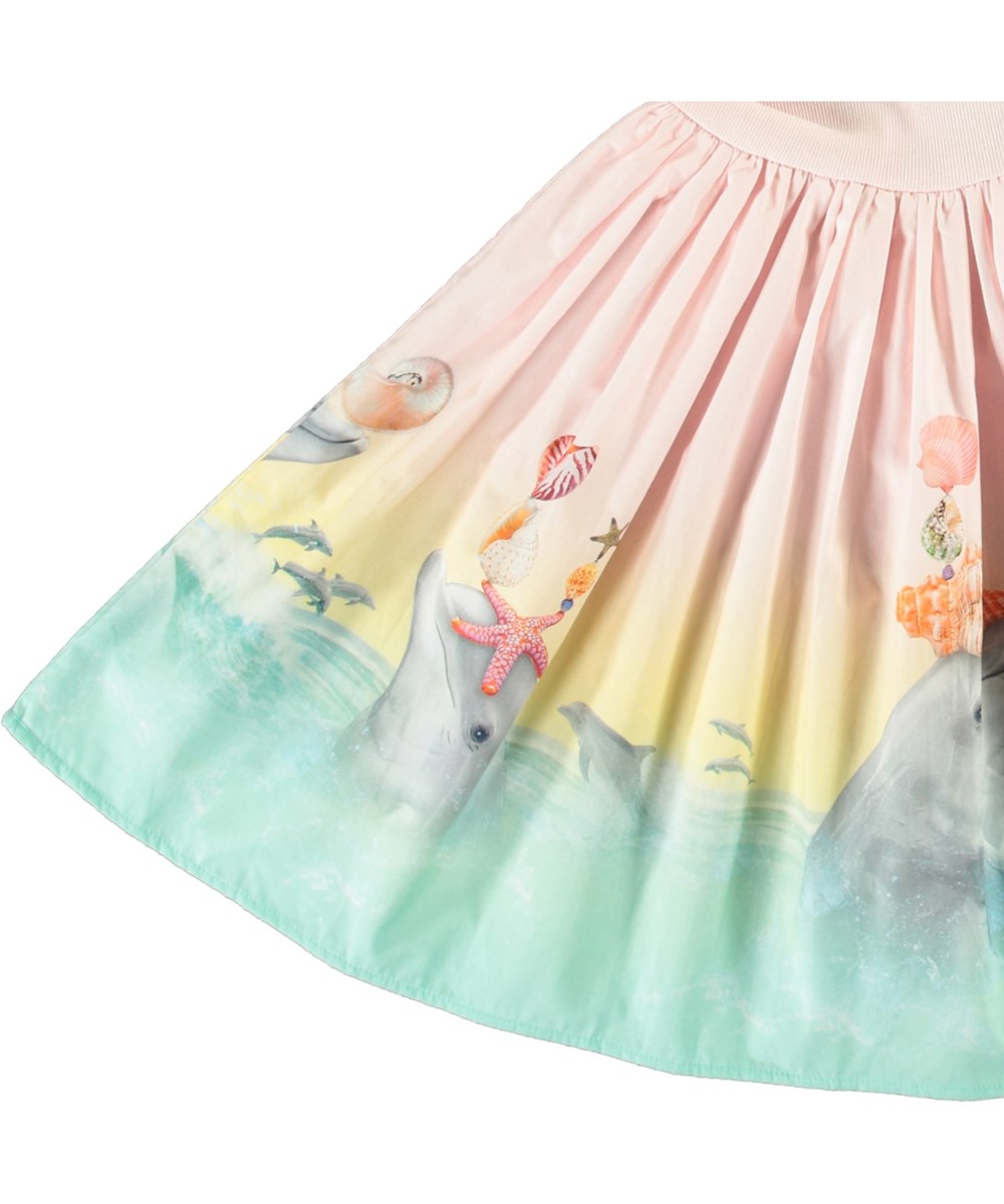 Cissa - Wave Jumping - Pink short-sleeved dress for children in organic cotton with a snug ribbed jersey top and poplin skirt.