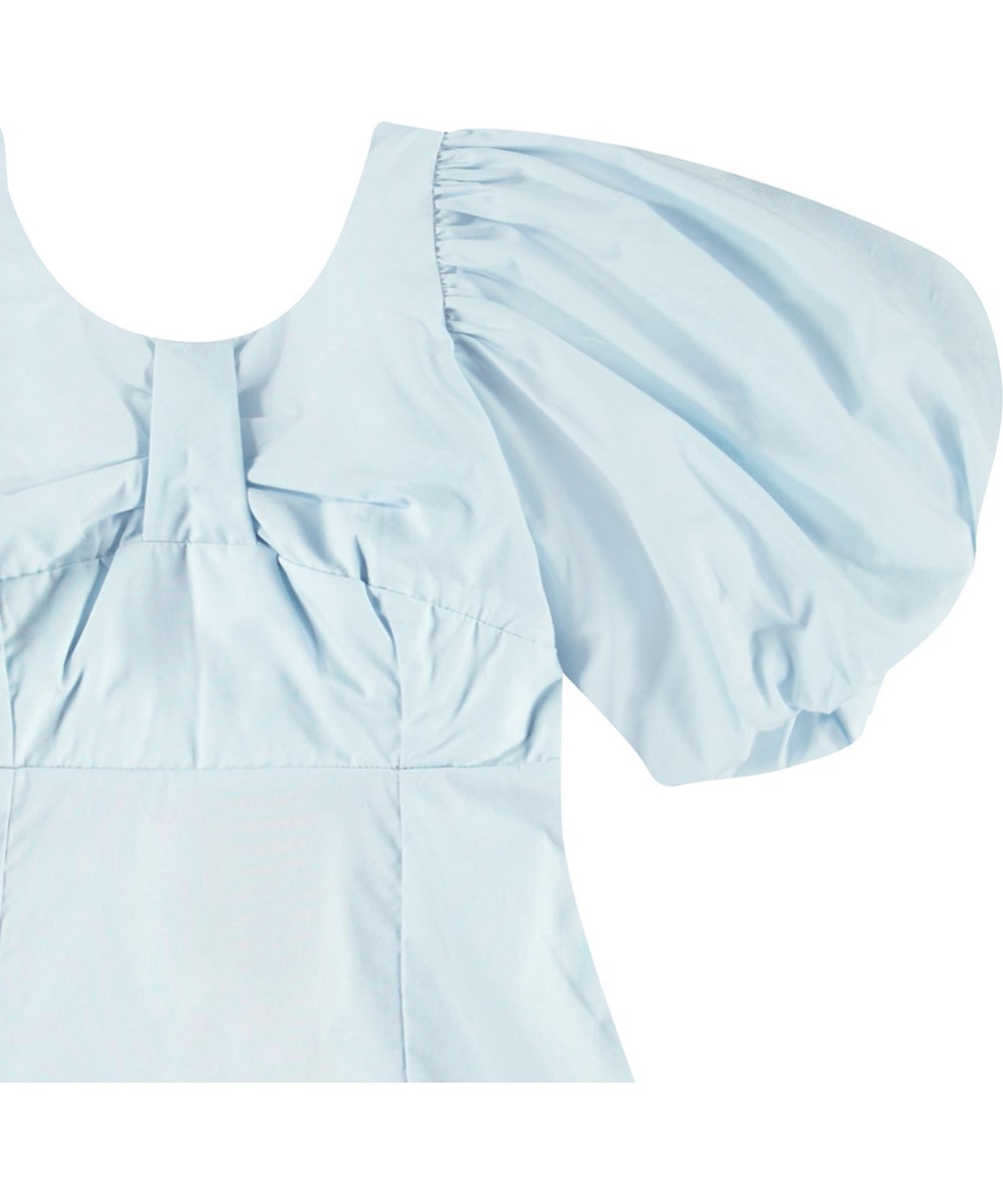 Cissy - Skywriting - Light blue dress in organic cotton for children with puff sleeves.