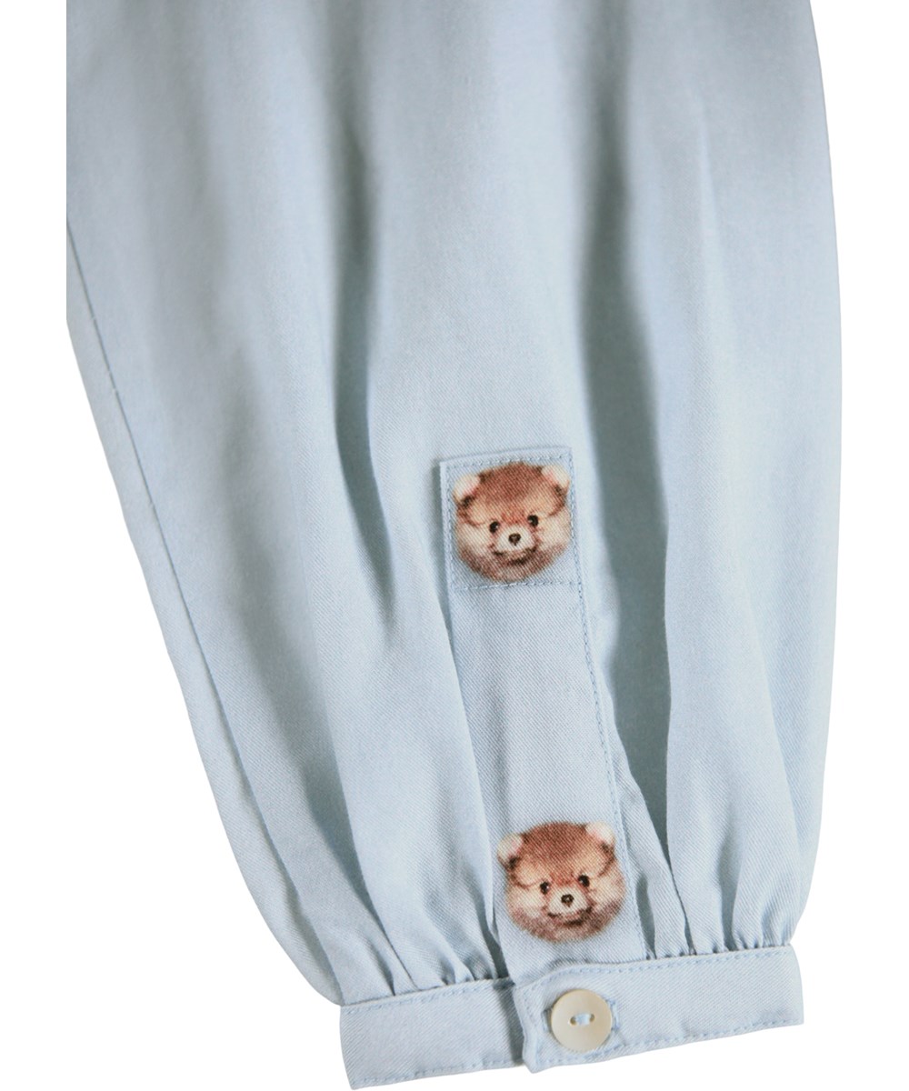 Clara - Pocket Pets - Nice light blue dress for children made of viscose with a print of cute animals.