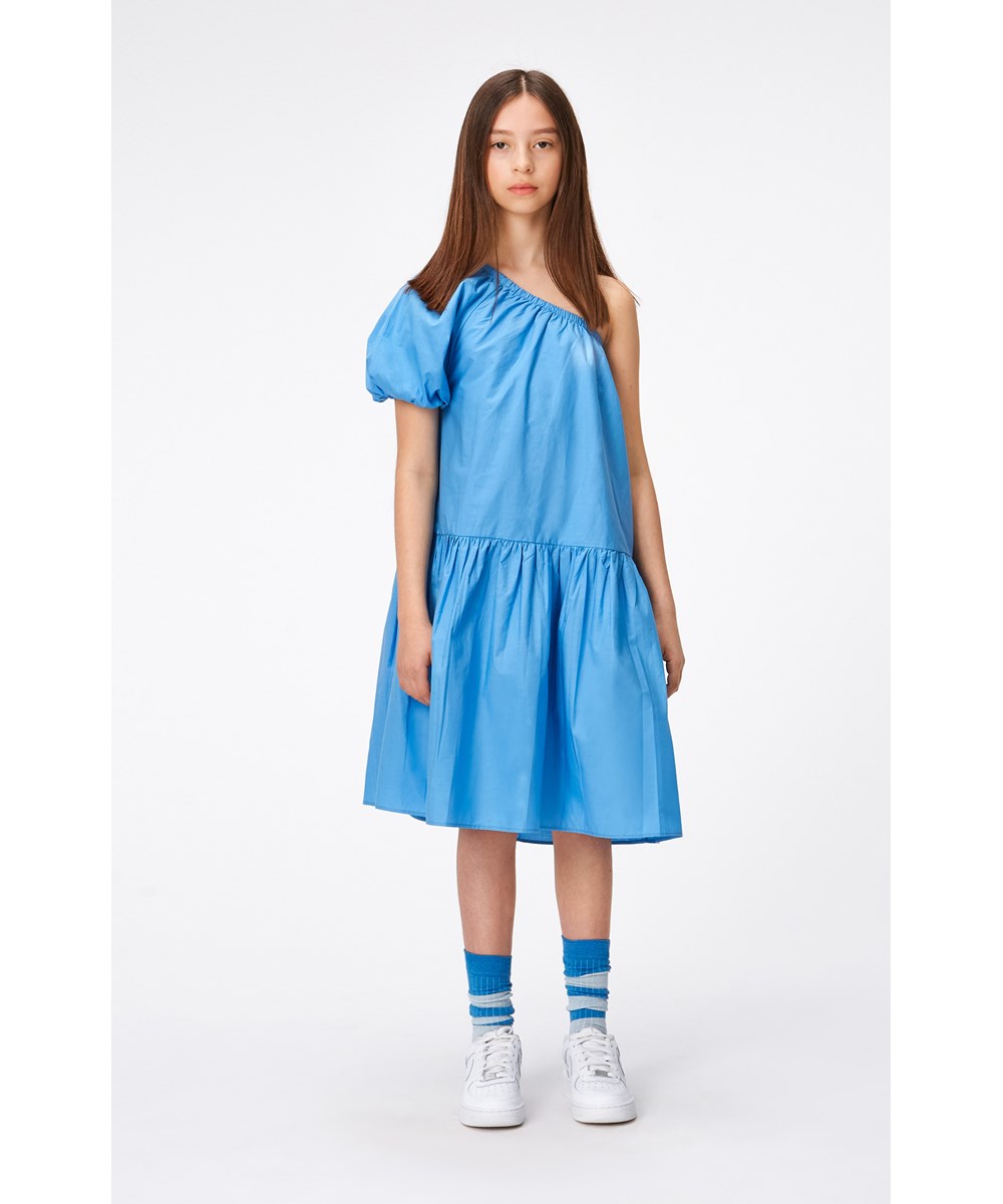 Clarabelle - Forget Me Not - Blue, one-shoulder dress in organic cotton